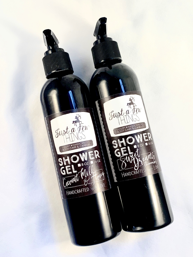 a photo of two black pump bottles with product labels demonstrating print design by Allyson DuPont Designs