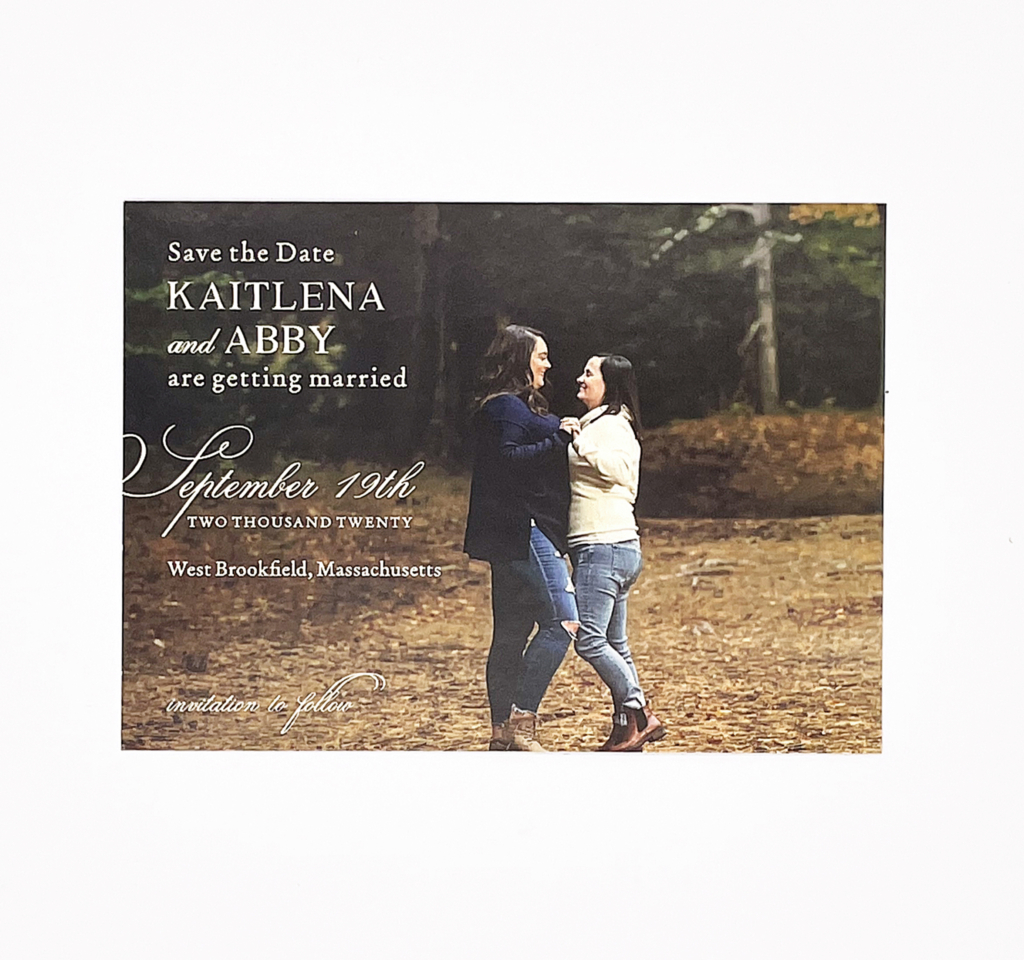 a photo save the date showing two women in fall scenery with white text on the left